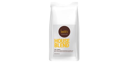 Händler - Komberg - Houseblend 100% Arabica, Runder Blend mit Milchschokoladenoten, unterstützt von Nuss- und Karamellnoten sowie zarten Orangenaromen. - Barista’s Kaffee 