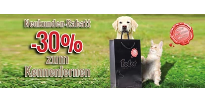 Händler - bevorzugter Kontakt: Online-Shop - Rabenwald - Das Bild zeigt eine Katze und einen kleinen Hund neben mit einer Fedor® Tragetasche sitzend. Daneben steht „Neukunden-Rabatt -30% zum Kennenlernen!“ geschrieben. - Fedor® Tiernahrung