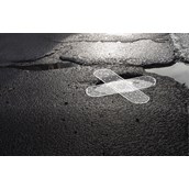 Unternehmen - Reparaturasphalt bei Straßenschaden - AIRphalt Kaltasphalt