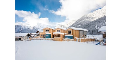 Händler - Art des Unternehmens: Beherbergungsbetrieb - Winterurlaub inmitten der Kitzbüheler Alpen - Alpegg Chalets