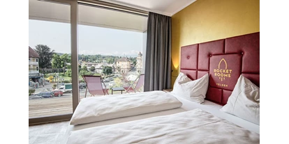 Händler - Bezirk Villach-Land - City Hotel mit herrlichem Seeblick - Hotel Rocket Rooms Velden