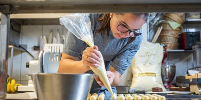 Händler - vegetarische Küche - hausgemachte Pralinen werden hergestellt - Posthotel Radstadt