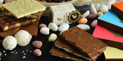 Händler - überwiegend Fairtrade Produkte - Wolfsgraben - Schokolade und Süßwaren in Hülle und Fülle. - Julius Meinl am Graben