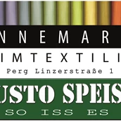 Unternehmen - Logo Annemarie Heimtextilien GmbH mit Gusto Speis II - Annemarie Heimtextilien GmbH
