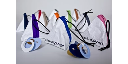 Händler - überwiegend Fairtrade Produkte - Münchendorf - Taschen wie aus Papier!
Schnullergaragen - Taschen wie aus Papier!