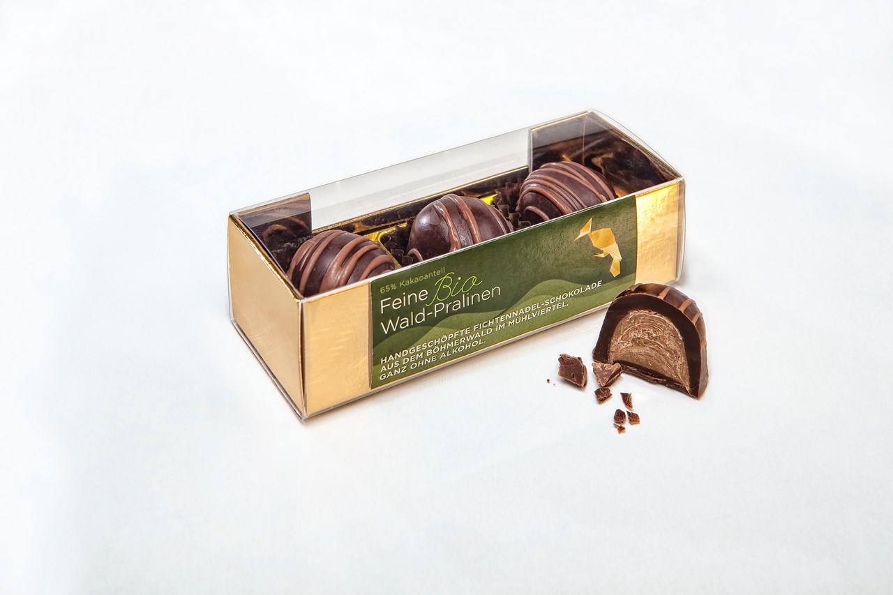 FEINE bioWALDSCHOKOLADE Produkt-Beispiele Pralinen Edelbitter 3-er FEINE bioWALDSCHOKOLADE