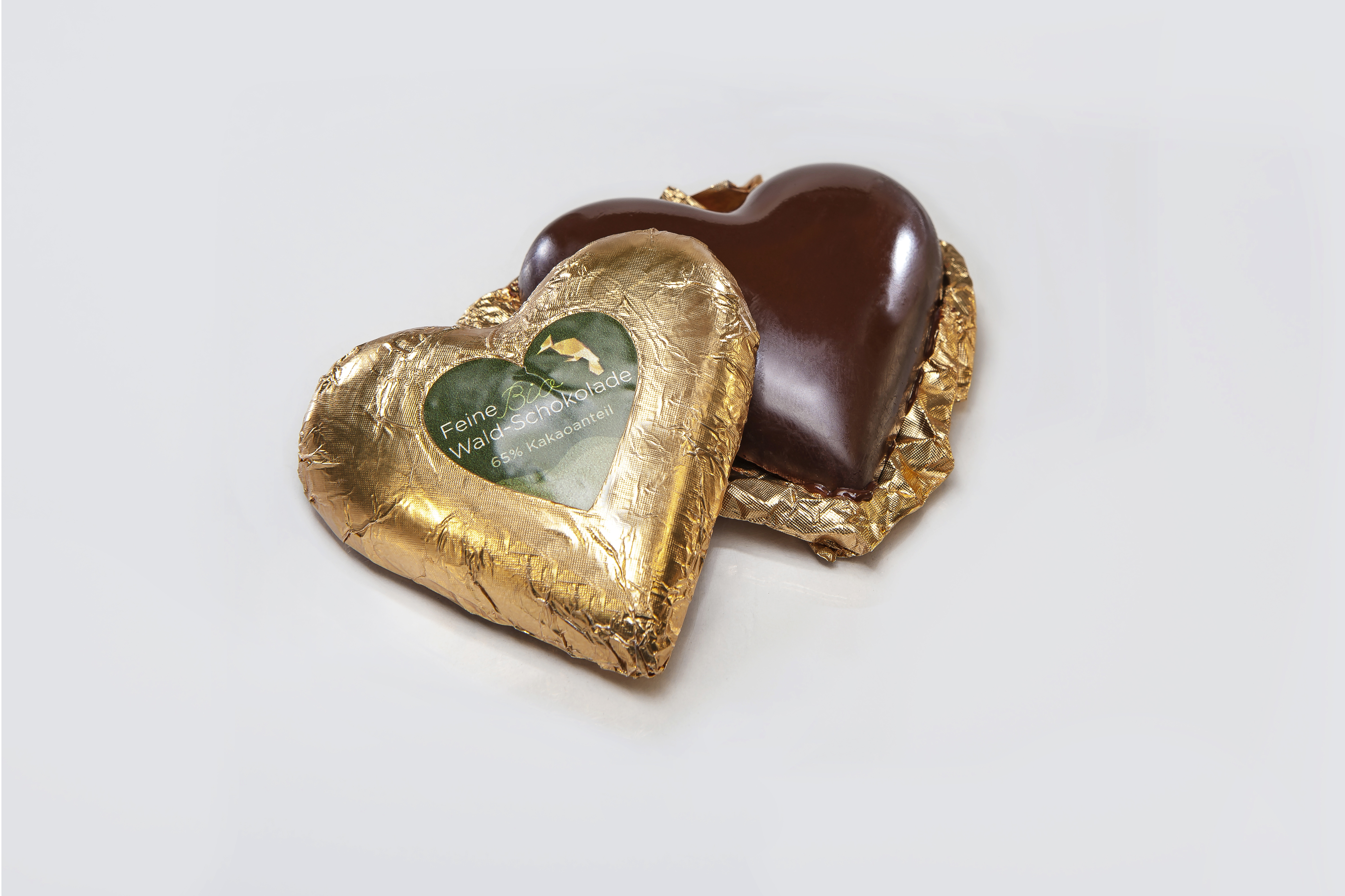 FEINE bioWALDSCHOKOLADE Produkt-Beispiele Goldherz Edelbitter, ca.30g FEINE bioWALDSCHOKOLADE