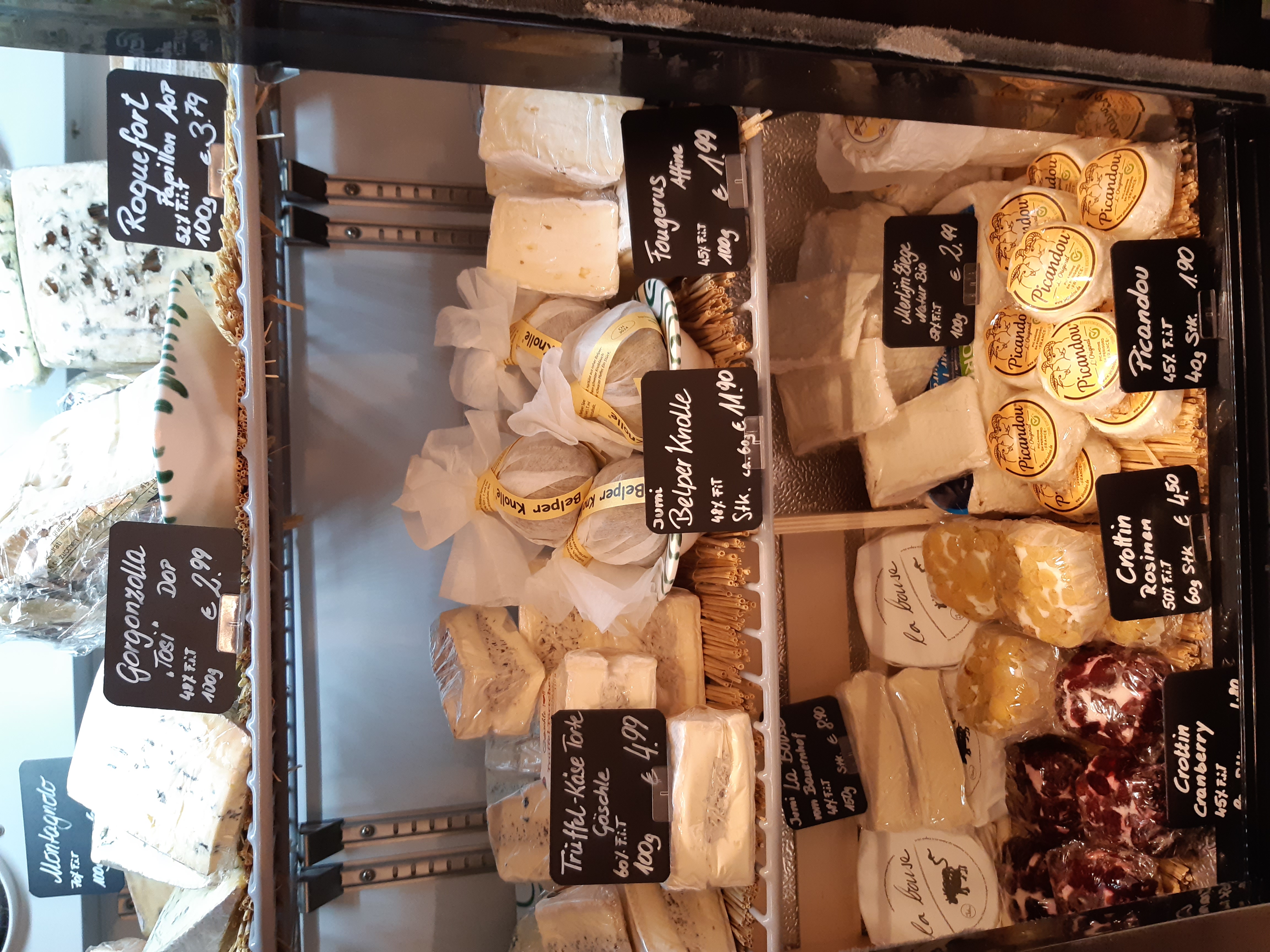 KAS KG Produkt-Beispiele Käse, Wein,Schokolade, Wurst und Speck