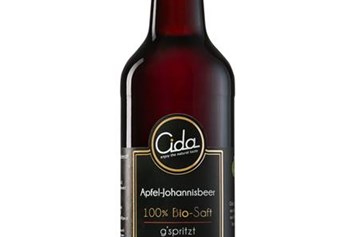 Unternehmen: Bio-Saft gespritzt Apfel-Johannisbeere und mild mit Kohlensäure versetzt. 0,5 l oder 0,33 l Flasche mit Schraubverschluss - Cida e.U.